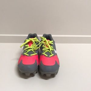 Under Armour softball cleats.